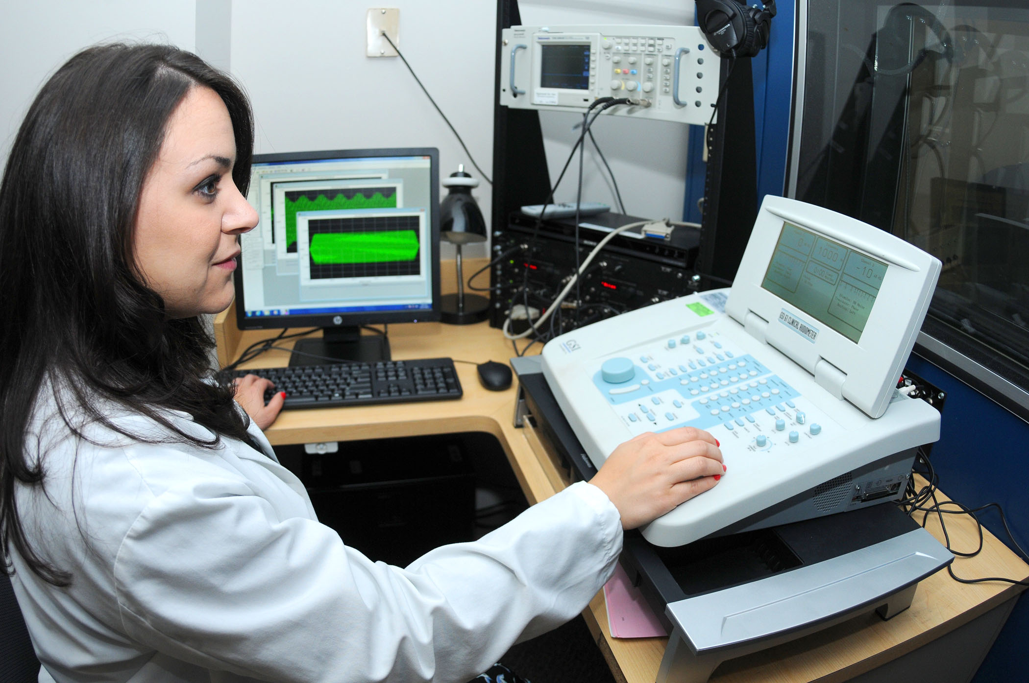 audiology student performing testing